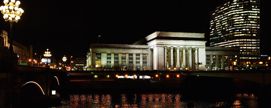 Philadelphia Photograph - Buildings Lit Up At Night At A Railroad by Panoramic Images