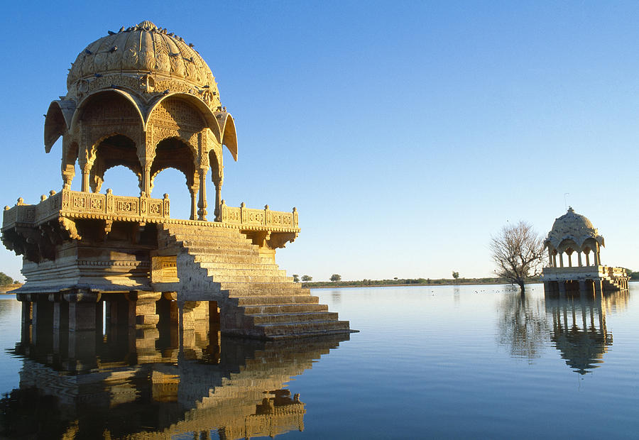 Buildings on Gadi Sagar lake in Jaisalmer, Rajasthan, India Photograph by GorazdBertalanic