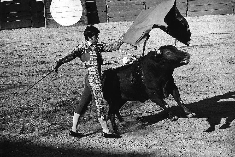 Bull Fight Matador Charging Bull Us-mexico Mexico Border Town Nogales Sonora Mexico   1978-2012 Photograph
