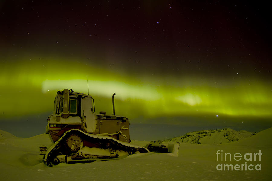 bulldozer in the Northern lights Photograph by Gunnar Orn Arnason