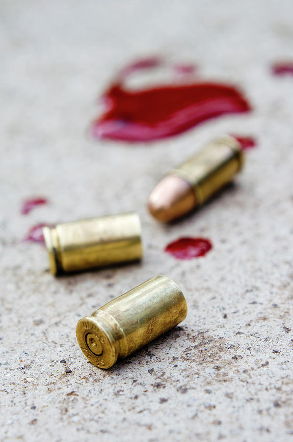 Bullet Casing And Bullet Photograph by Jim Varney/science Photo