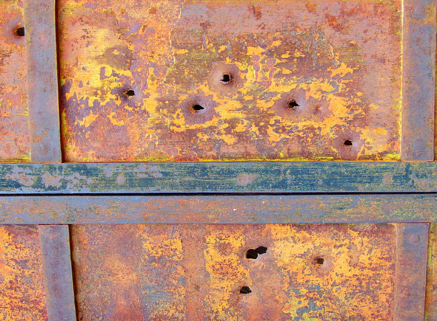 Bullet Holes And Rust Photograph by Marilyn Diaz