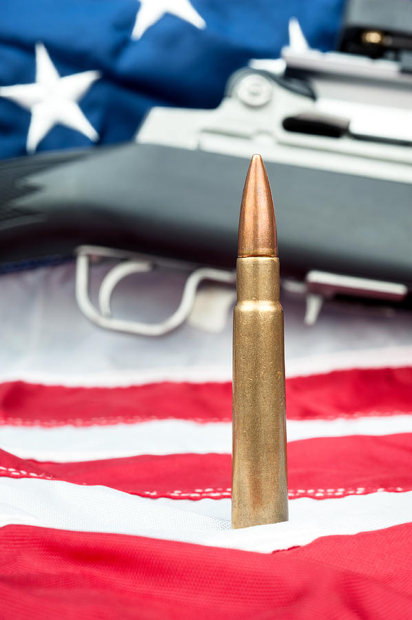 Bullet on flag Photograph by Joe Belanger - Fine Art America