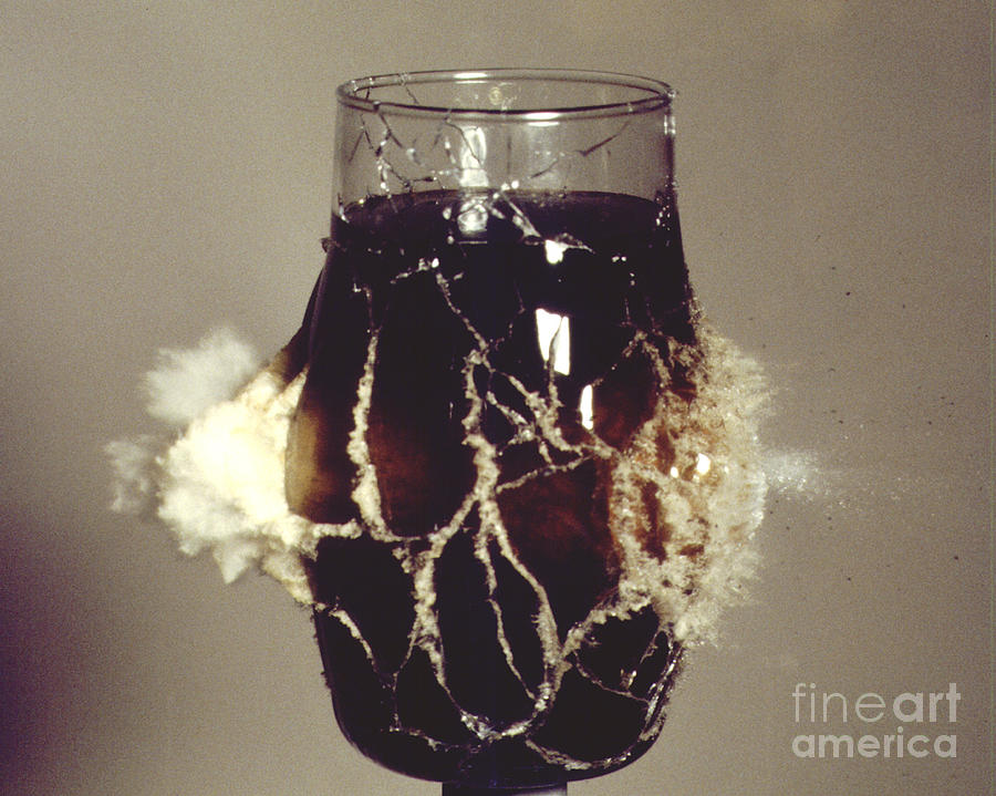 Bullet Piercing Glass Of Soda Photograph by Gary S. Settles