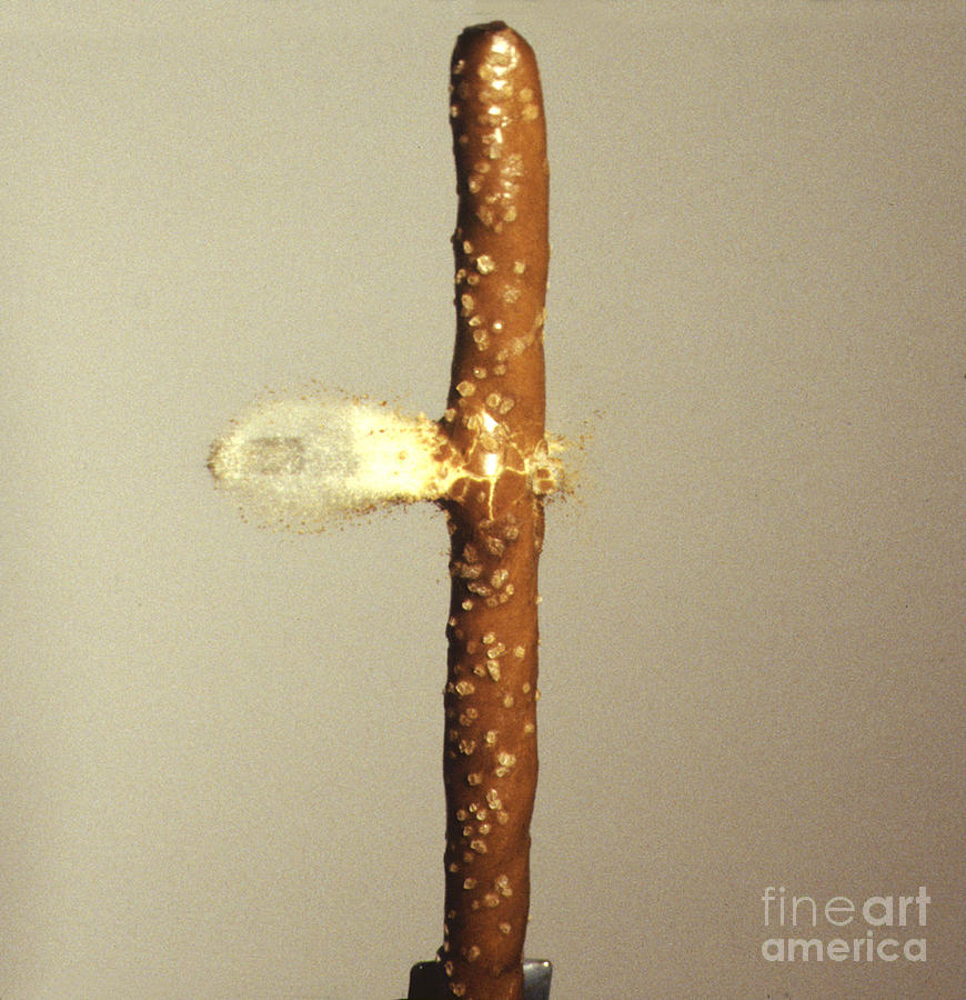 Bullet Piercing Pretzel Stick Photograph by Gary S. Settles