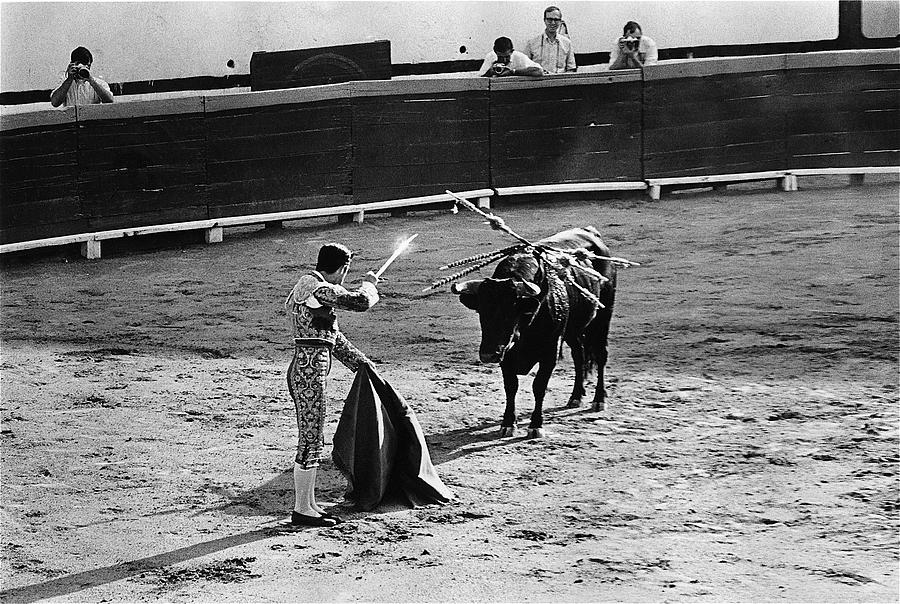 Bullfighter with raised sword ring Nogales Sonora Mexico 1969  Photograph by David Lee Guss