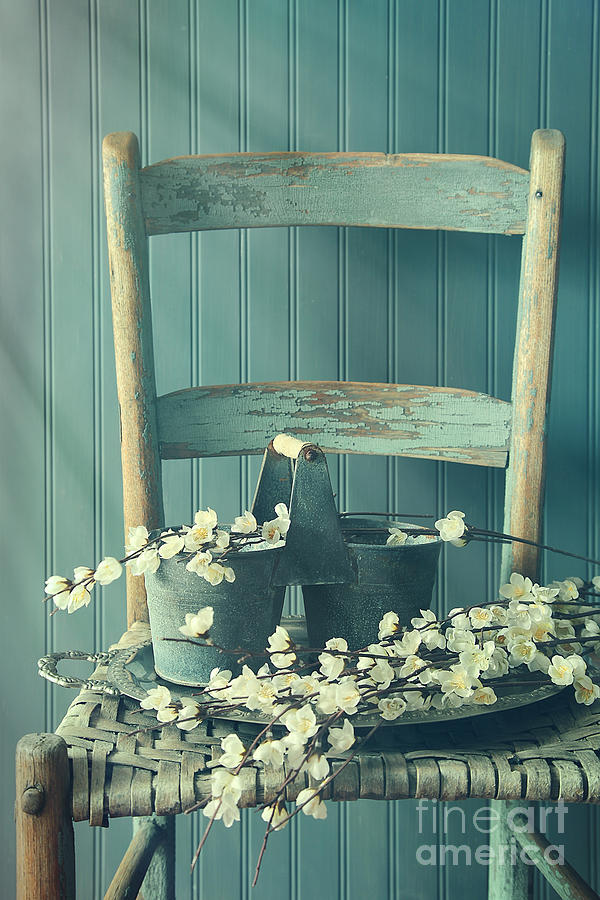 Bunch of fake apple blossoms on old chair Photograph by Sandra Cunningham