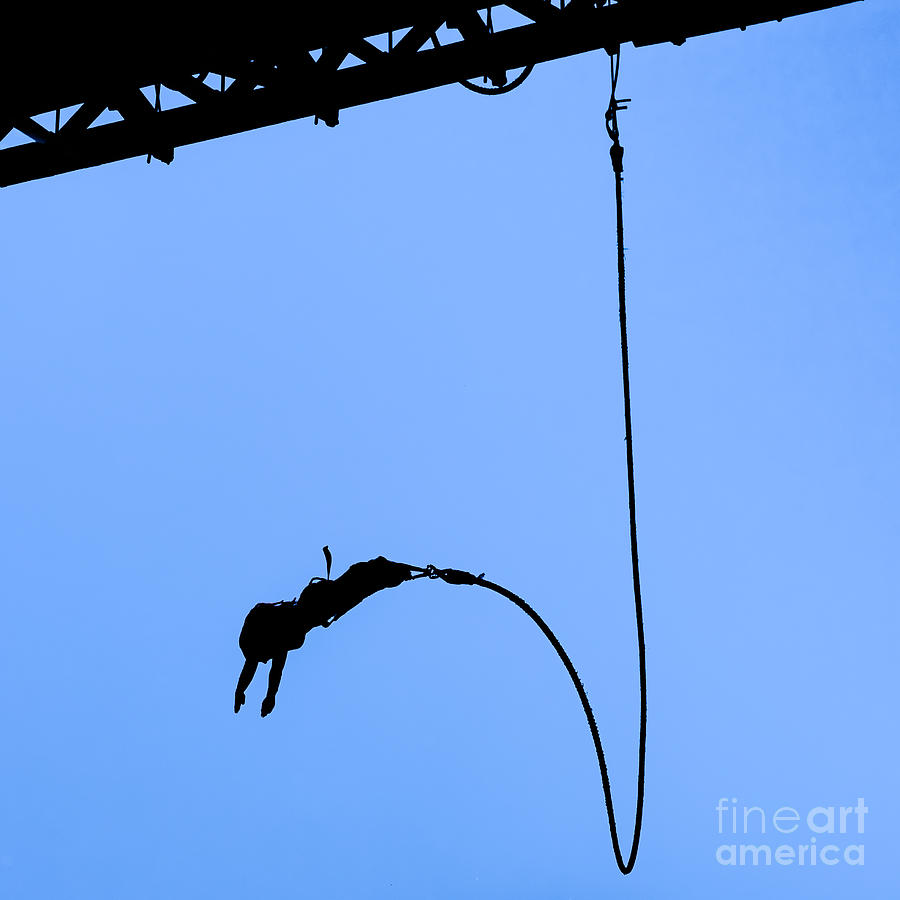Bungee Jumper Against Blue Sky Photograph