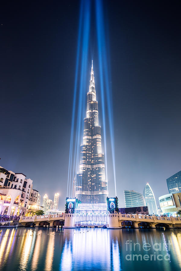 Burj Khalifa with light beams - Dubai - UAE Photograph by Matteo Colombo