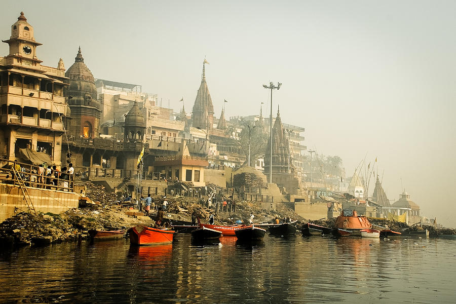 Burning ghats of varanasi with ancient temples Photograph by NomadicImagery