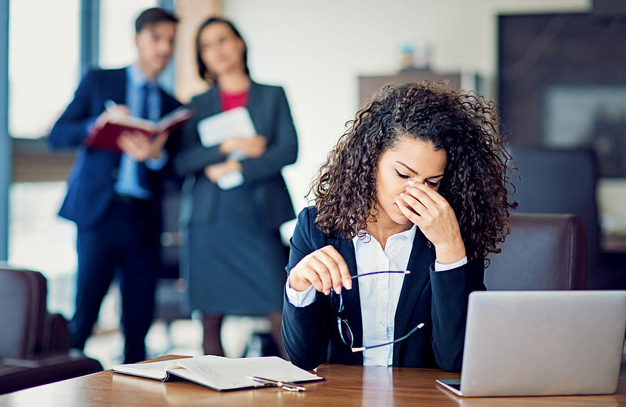 Burnout businesswoman under pressure in the office Photograph by Praetorianphoto Burnout businesswoman under pressure in the office Photograph by Praetorianphoto