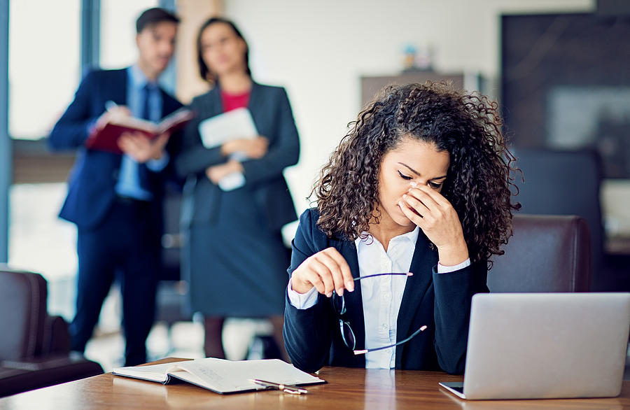 Burnout businesswoman under pressure in the office Photograph by Praetorianphoto