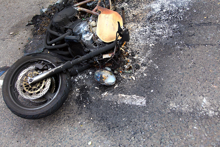 Burnt out Motorbike Photograph by Mattjeacock