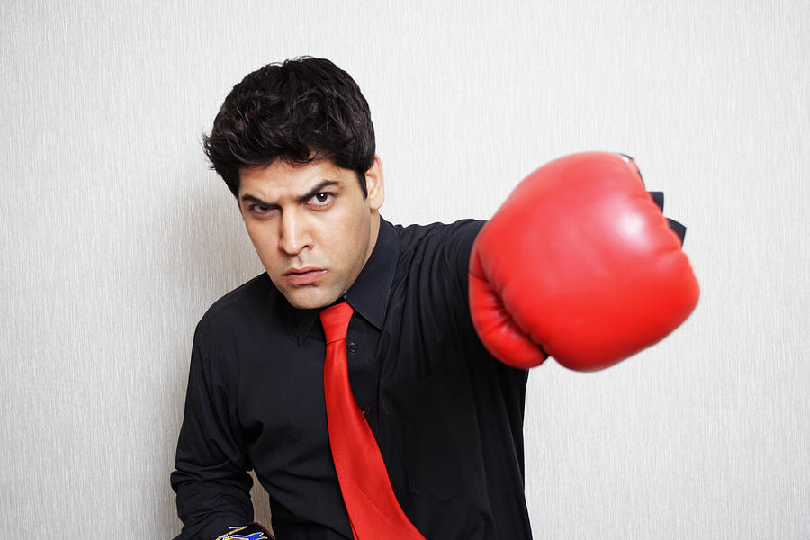 Businessman in boxing gloves Photograph by Visage
