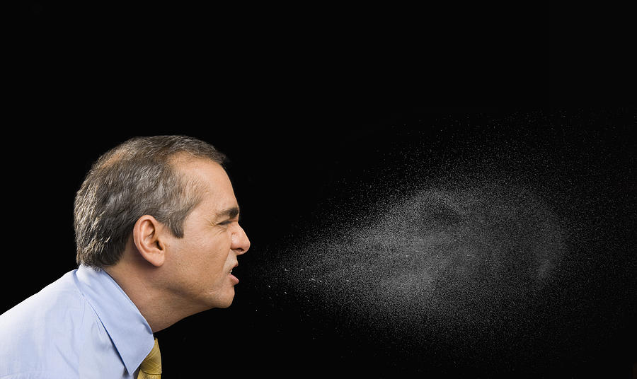 Businessman sneezing Photograph by John M Lund Photography Inc