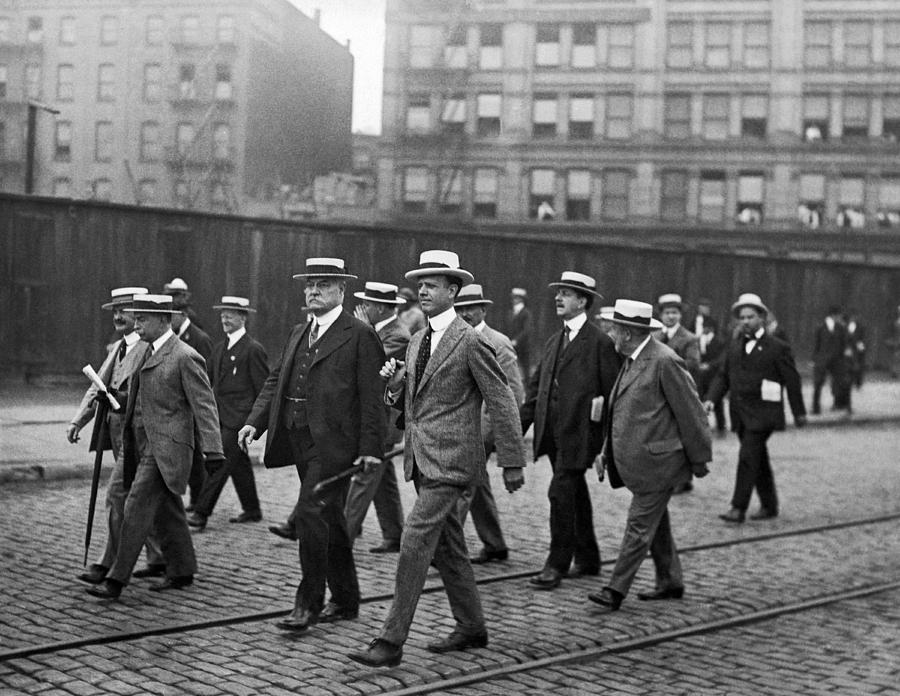 New York City Photograph - Businessmen Walking In NY by Underwood Archives