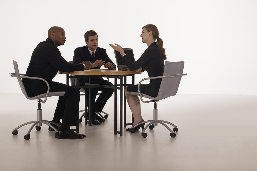 Businesspeople in meeting Photograph by Comstock Images
