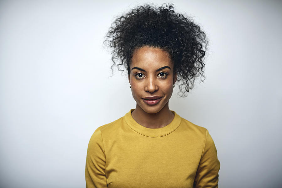 Businesswoman with curly hair over white Photograph by Morsa Images Businesswoman with curly hair over white Photograph by Morsa Images