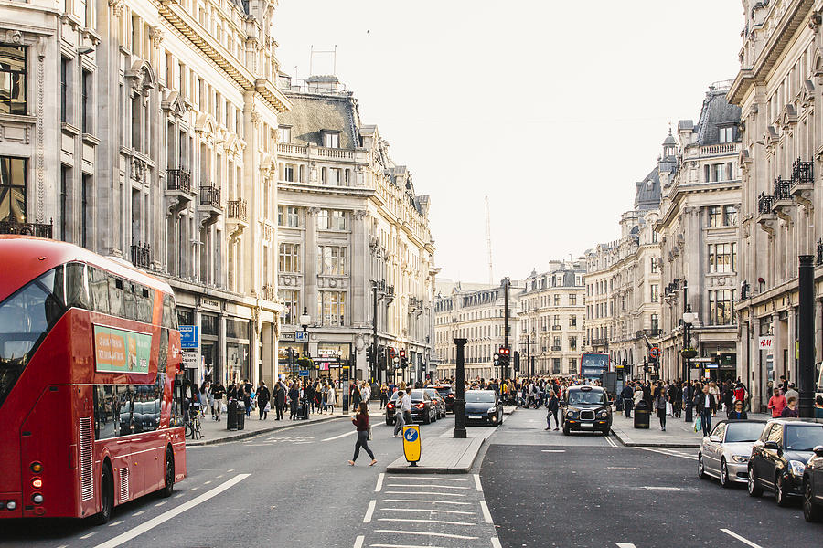 Busy day on Regent street with crowds of people and cars, London, England, UK Photograph by Alexander Spatari