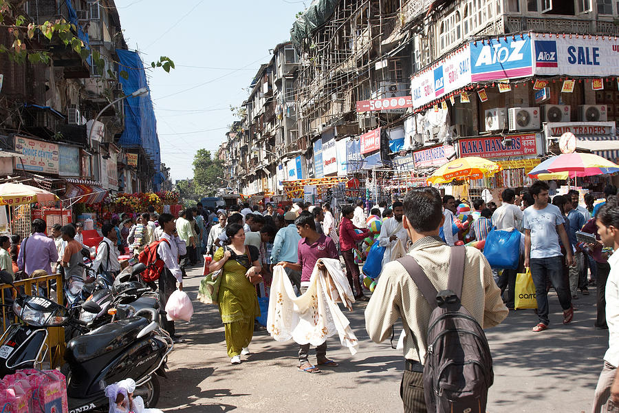 Busy Mumbai street corner at Crawford Market Photograph by Tirc83