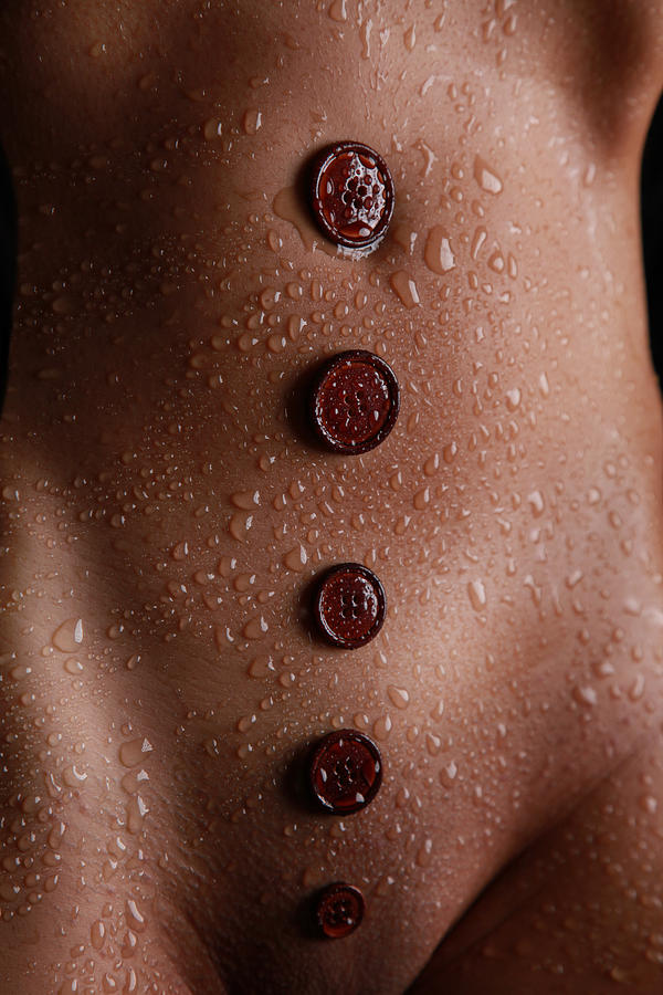 Buttons on wet body Photograph by Rod Meier