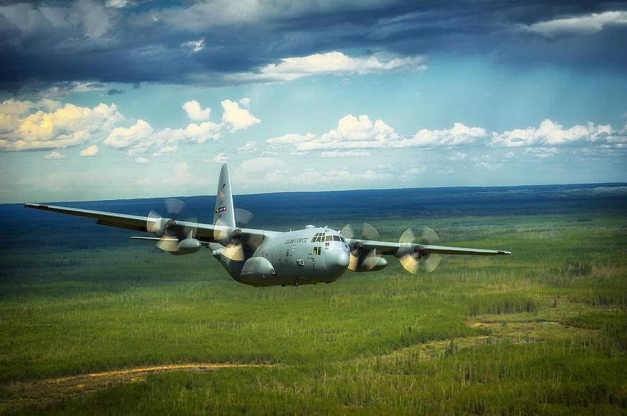 Transportation Photograph - C-130 Hercules over Canada by Mountain Dreams