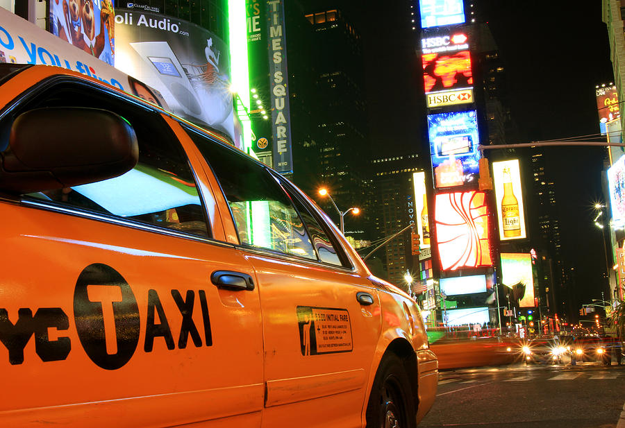 Cab in Times Square  Photograph by John McGraw