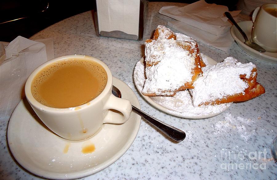 Cafe Au Lait and Bingnets at Cafe Dumonde Photograph by Saundra Myles