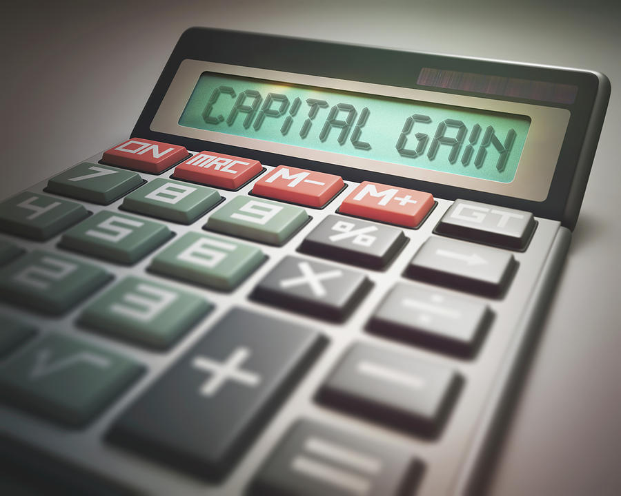 Calculator With Capital Gain Photograph by Ktsdesign/science Photo