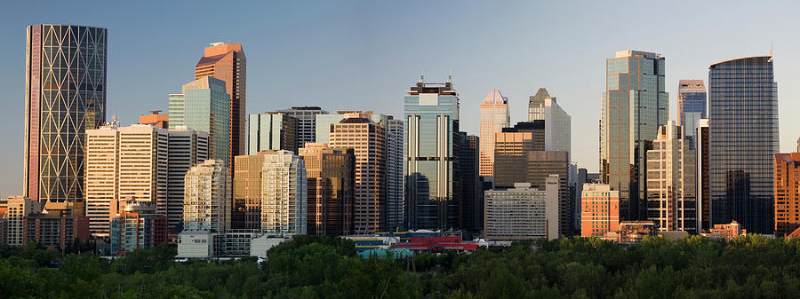 Calgary Skyline At Sunrise With Blue Sky Photograph by Michael Interisano / Design Pics