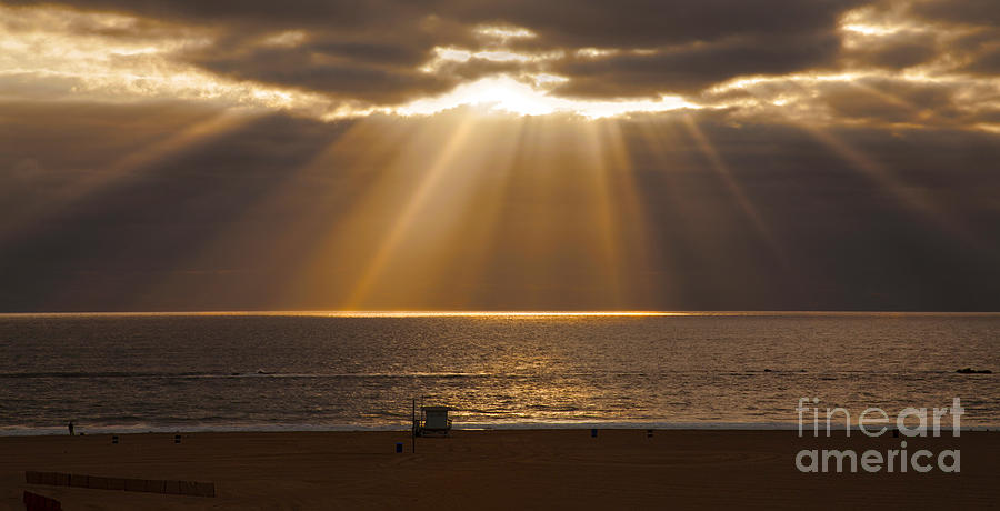 Calm Clouds With Magnificent Sun Rays Over Ocean Photograph
