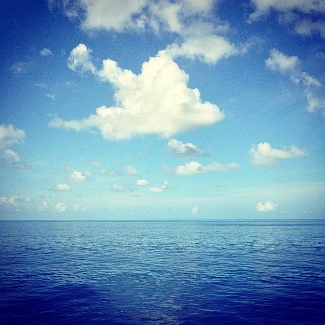 Clouds Photograph - Calm Seas, A Cool Breeze, And Endless by John W Moe