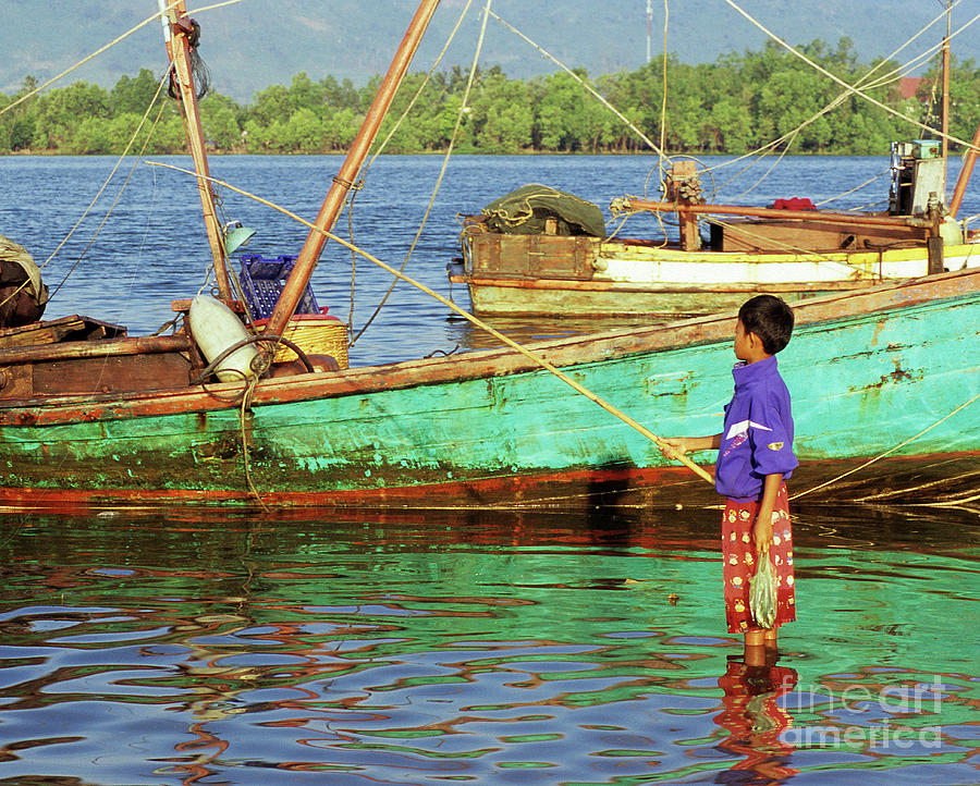 Cambodian Boy Fishing 01 Photograph by Rick Piper Photography