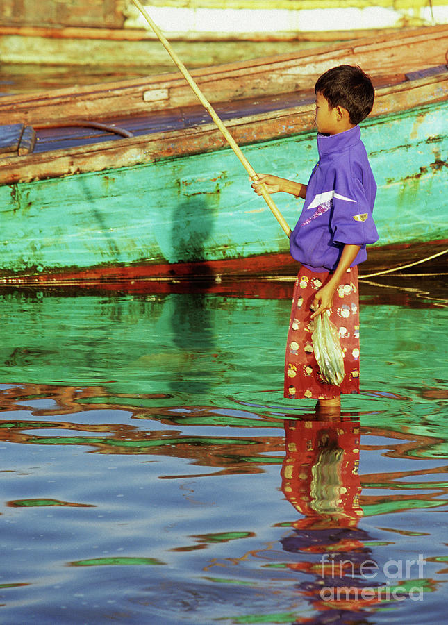 Cambodian Boy Fishing 02 Photograph by Rick Piper Photography