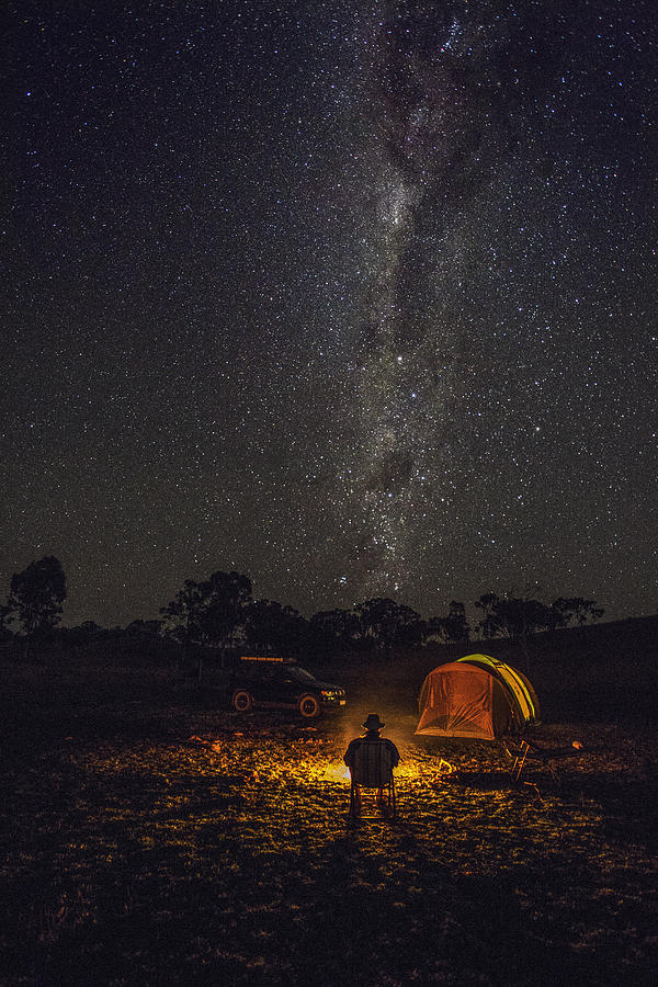 Camping in a tent under the Milky Way. Photograph by David Trood