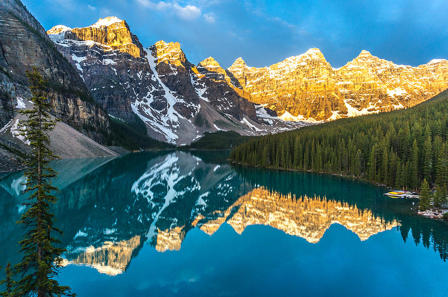 Canada, Banff National Park, Canadian Rockies, Mountains reflecting in calm lake at sunrise Photograph by Janetteasche