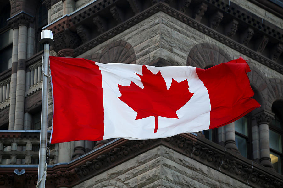 Canada Flag On Parliament Photograph by Artland