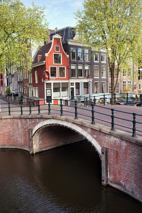 Architecture Photograph - Canal Bridge and Houses in Amsterdam by Artur Bogacki
