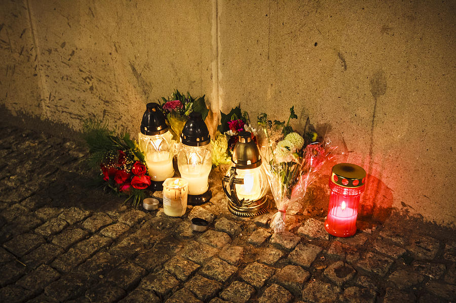 Candles at the street on Warsaw Uprising Remembrance Day Photograph by Luis Dafos
