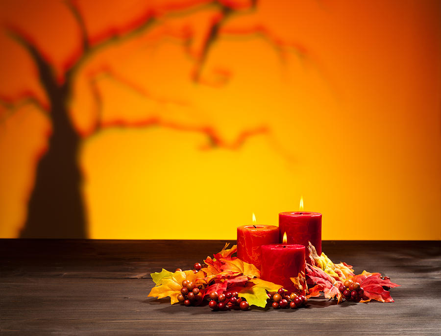 Candles in scary Halloween landscape Photograph by U Schade