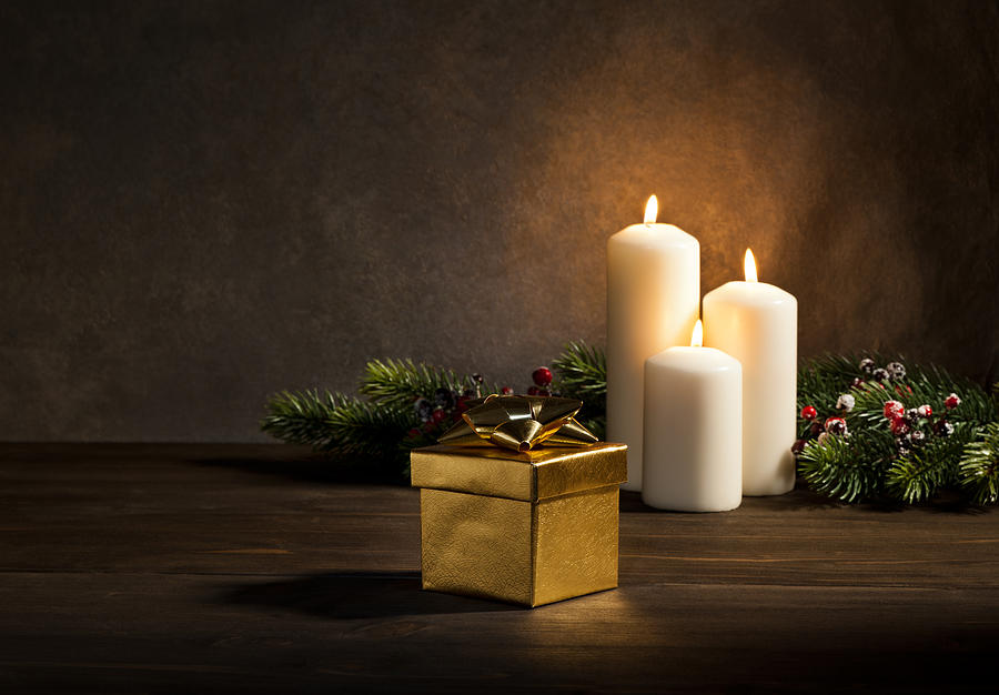 Candles present in Christmas setting Photograph by U Schade