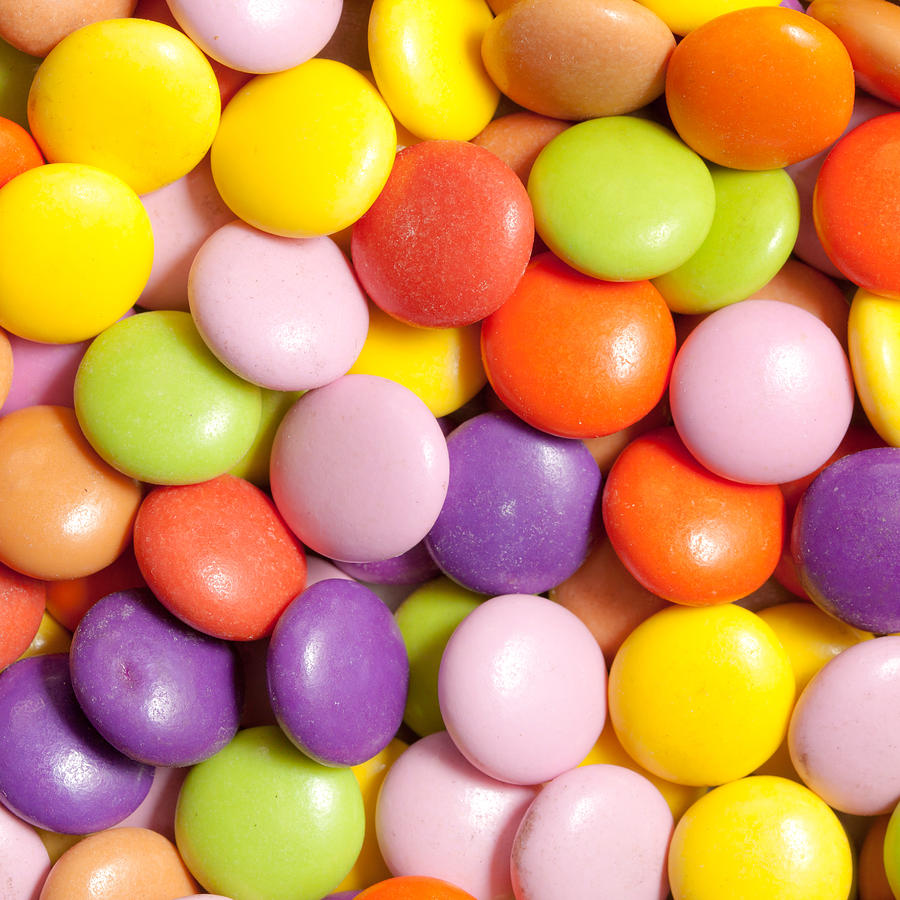 Candy Photograph - Candy background by Tom Gowanlock