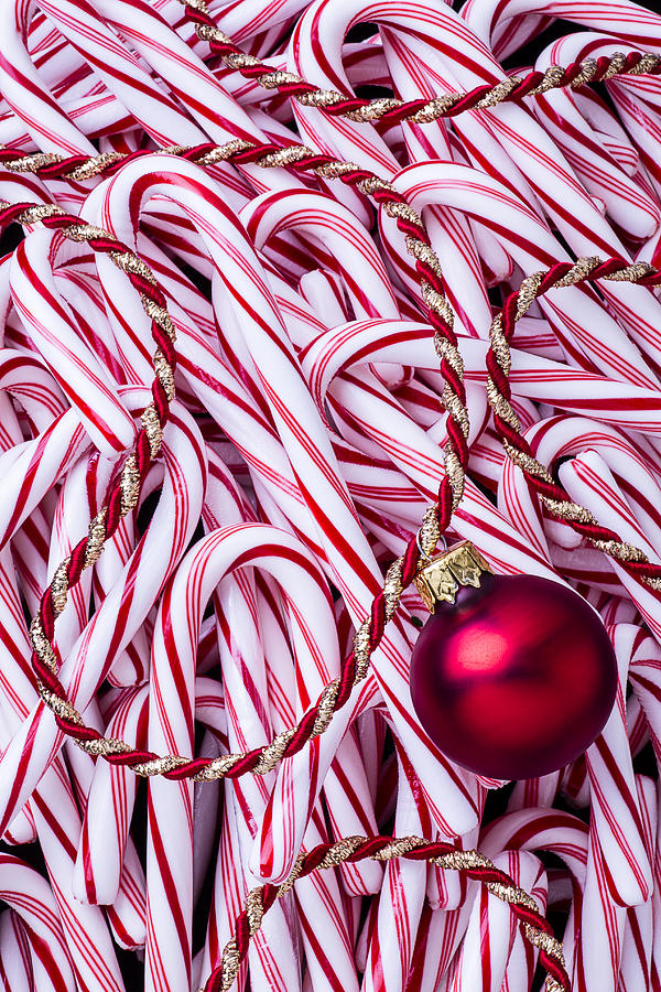 Christmas Photograph - Candy cane and red ornament by Garry Gay