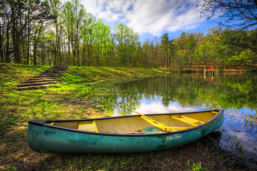 Mountain Photograph - Canoeing at the Lake by Debra and Dave Vanderlaan
