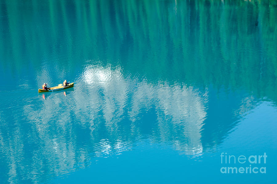 Canoeing in Lake Morraine Photograph by Oscar Gutierrez