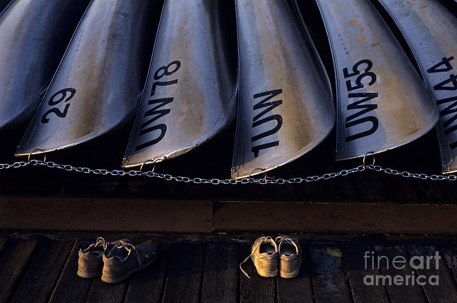 Canoes and Tennis shoes  Photograph by Jim Corwin