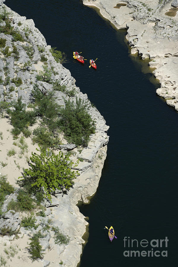 Nature Photograph - Canoes on the river Ardeche in southern France by Bernard Jaubert