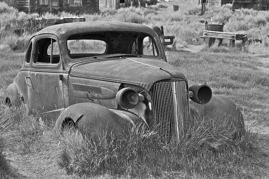 Car at Bodie in black and white Photograph by SC Heffner
