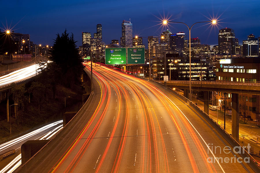 Car Lights On I-5 By Seattle Skyline Photograph by Jim Corwin