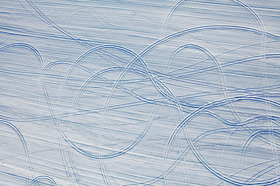 Car Tracks In The Snow Photograph by Dariuszpa